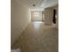 A large, empty basement with tile floors and a small window at 1988 Bencal Se Dr, Atlanta, GA 30316