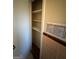 Walk-in closet with ample shelving at 1988 Bencal Se Dr, Atlanta, GA 30316