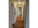 Hallway featuring hardwood floors and neutral paint at 1988 Bencal Se Dr, Atlanta, GA 30316