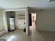Utility area with tile flooring, water heater, and space for washer/dryer hookups at 1988 Bencal Se Dr, Atlanta, GA 30316