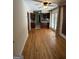 An open-concept living room flows into a kitchen with hardwood floors and natural light at 1988 Bencal Se Dr, Atlanta, GA 30316