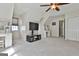 Neutral bedroom with a ceiling fan, desk and a large window to let in natural light at 208 Clifton Ln, Peachtree City, GA 30269