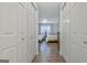 View of bedroom with two beds through closet doors at 204 Ridgelake Dr, Peachtree City, GA 30269