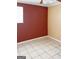 Bedroom featuring tile floors, a red wall and a window at 287 Henry Aaron Sw Ave, Atlanta, GA 30310