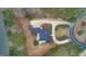An aerial view of a home with a driveway and a scenic lake nearby at 256 Allie Dr, Mcdonough, GA 30252