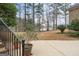 Scenic backyard with a view of a serene lake, perfect for relaxation and enjoying nature's beauty at 256 Allie Dr, Mcdonough, GA 30252