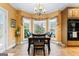 Breakfast nook featuring a bay window view of the private backyard at 256 Allie Dr, Mcdonough, GA 30252