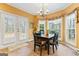 Cozy breakfast nook with large windows offering plenty of natural light at 256 Allie Dr, Mcdonough, GA 30252