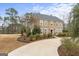 Lovely two story home with landscaped front yard and curved driveway at 256 Allie Dr, Mcdonough, GA 30252