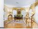 Cozy living room with hardwood floors, a fireplace, and elegant furnishings creating a welcoming atmosphere at 256 Allie Dr, Mcdonough, GA 30252