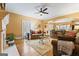 Open-concept living room flows into the kitchen and dining area at 256 Allie Dr, Mcdonough, GA 30252