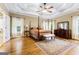 Spacious main bedroom with tray ceiling and natural light at 256 Allie Dr, Mcdonough, GA 30252