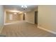 Large, neutral basement showcasing ample space with carpeted flooring and recessed lighting at 401 Robinson Rd, Peachtree City, GA 30269