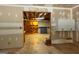Unfinished basement space ready for customization with exposed beams and a connected storage or utility area at 401 Robinson Rd, Peachtree City, GA 30269