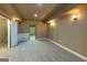 Spacious basement featuring neutral walls, carpeted flooring, and multiple doorways for easy access at 401 Robinson Rd, Peachtree City, GA 30269