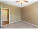 Bedroom with carpet and ceiling fan at 401 Robinson Rd, Peachtree City, GA 30269