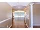 Stunning foyer with gleaming hardwood floors and an inviting view of the living room at 401 Robinson Rd, Peachtree City, GA 30269