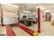 Well-equipped garage showcasing a car lift and various automotive tools, ready for car enthusiasts at 401 Robinson Rd, Peachtree City, GA 30269