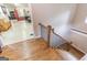 Staircase leading to an attached garage and a well-equipped workshop perfect for DIY projects at 401 Robinson Rd, Peachtree City, GA 30269