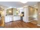 Eat-in kitchen featuring granite countertops, stainless steel appliances, and tiled backsplash at 401 Robinson Rd, Peachtree City, GA 30269