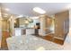 Spacious kitchen with granite counters, stainless appliances, and an open floor plan at 401 Robinson Rd, Peachtree City, GA 30269