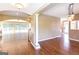 Spacious living room with hardwood floors, fireplace, and plenty of natural light at 401 Robinson Rd, Peachtree City, GA 30269