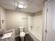 Full bathroom with granite vanity and shower-tub combo at 5743 Rock Rd, Union City, GA 30291
