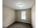 Comfortable bedroom with carpet, a window for natural light, and neutral colored walls at 5743 Rock Rd, Union City, GA 30291