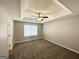 Bright bedroom with neutral walls, carpet, a ceiling fan, and a window that provide plenty of natural light at 1202 Grove Trail Pass, Douglasville, GA 30134