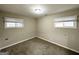 Bedroom featuring neutral tones, carpet, and natural light, perfect for relaxation at 2310 Ousley Ct, Decatur, GA 30032