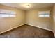 Standard bedroom with carpet, good natural light, and neutral color palette at 2310 Ousley Ct, Decatur, GA 30032