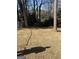 Spacious backyard with mature trees providing shade at 1125 Carlo Sw Ct, South Fulton, GA 30331