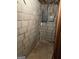Unfinished basement area showing electrical components and cinder block walls, allowing customization at 1125 Carlo Sw Ct, South Fulton, GA 30331