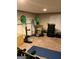 Basement area equipped with a weightlifting station and exercise equipment, great for fitness enthusiasts at 1125 Carlo Sw Ct, South Fulton, GA 30331