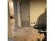 Finished basement area with access to stairs and a view of fitness equipment for a home gym setup at 1125 Carlo Sw Ct, South Fulton, GA 30331
