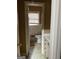 A cozy bathroom features tiled walls, a window with blinds, and traditional fixtures at 1125 Carlo Sw Ct, South Fulton, GA 30331