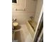 Compact bathroom with a bathtub, toilet, and vanity, providing essential amenities at 1125 Carlo Sw Ct, South Fulton, GA 30331