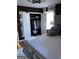Comfortable bedroom with a mirrored closet, large window, and plush bedding at 1125 Carlo Sw Ct, South Fulton, GA 30331
