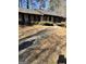 View of the front yard with a sidewalk leading to the front door of a traditional single-story home at 1125 Carlo Sw Ct, South Fulton, GA 30331