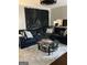 Spacious living room with a large sectional, round coffee table, and plush area rug at 1125 Carlo Sw Ct, South Fulton, GA 30331