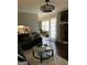 Comfortable living room boasts a decorative ceiling fan and lots of natural light at 1125 Carlo Sw Ct, South Fulton, GA 30331
