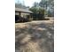 Spacious yard with a covered parking area at 1125 Carlo Sw Ct, South Fulton, GA 30331