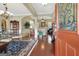 Inviting entryway featuring hardwood floors, detailed trim, arched openings and lots of light at 115 Foxford Run, Tyrone, GA 30290