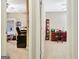 Dual view of two offices featuring neutral walls, carpet floors and office furnishings at 115 Foxford Run, Tyrone, GA 30290