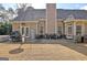 Outdoor patio with seating, grill, and accessories, perfect for relaxing and entertaining at 115 Foxford Run, Tyrone, GA 30290