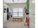 Walk-in closet with a window, built-in shelving, and hanging racks at 115 Foxford Run, Tyrone, GA 30290
