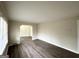 Bright living room featuring sleek floors and neutral paint, creating a modern and inviting space at 2030 Mark Trl, Decatur, GA 30032