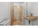 Bathroom featuring a shower and sink, perfect for functional comfort and convenience at 110 Bevis Cir, Bowdon, GA 30108