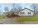 Traditional single-story home with a metal roof and a convenient carport for covered parking at 110 Bevis Cir, Bowdon, GA 30108