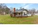 Classic single-story home with a metal roof and covered porch, set on a well-manicured lawn at 110 Bevis Cir, Bowdon, GA 30108